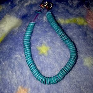 Clay bead with stretch string